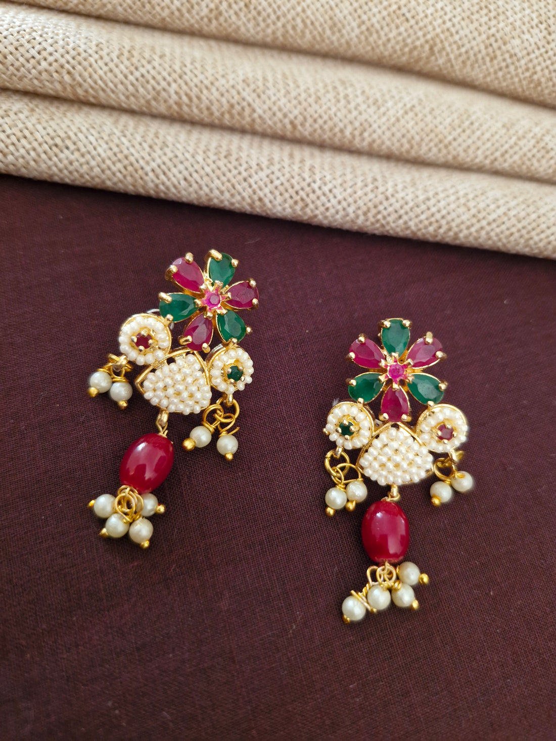 Ridhivam Royal Multi-Strand Pearl Choker Set with Ruby & Emerald Floral Motifs