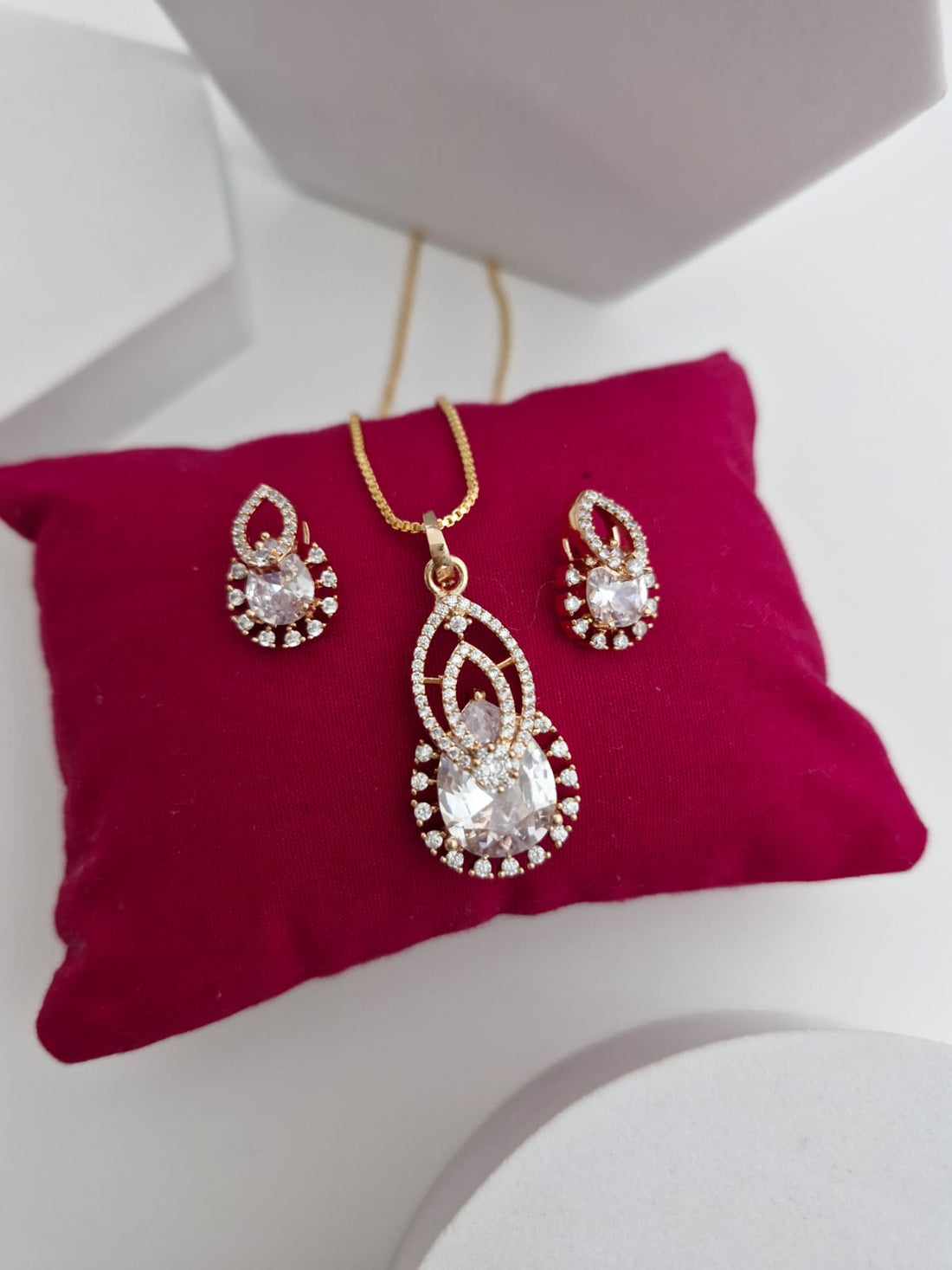 Royal Halo Pear-Cut American Diamond Pendant Set in Rose Gold Plating