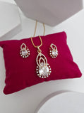 Royal Halo Pear-Cut American Diamond Pendant Set in Rose Gold Plating