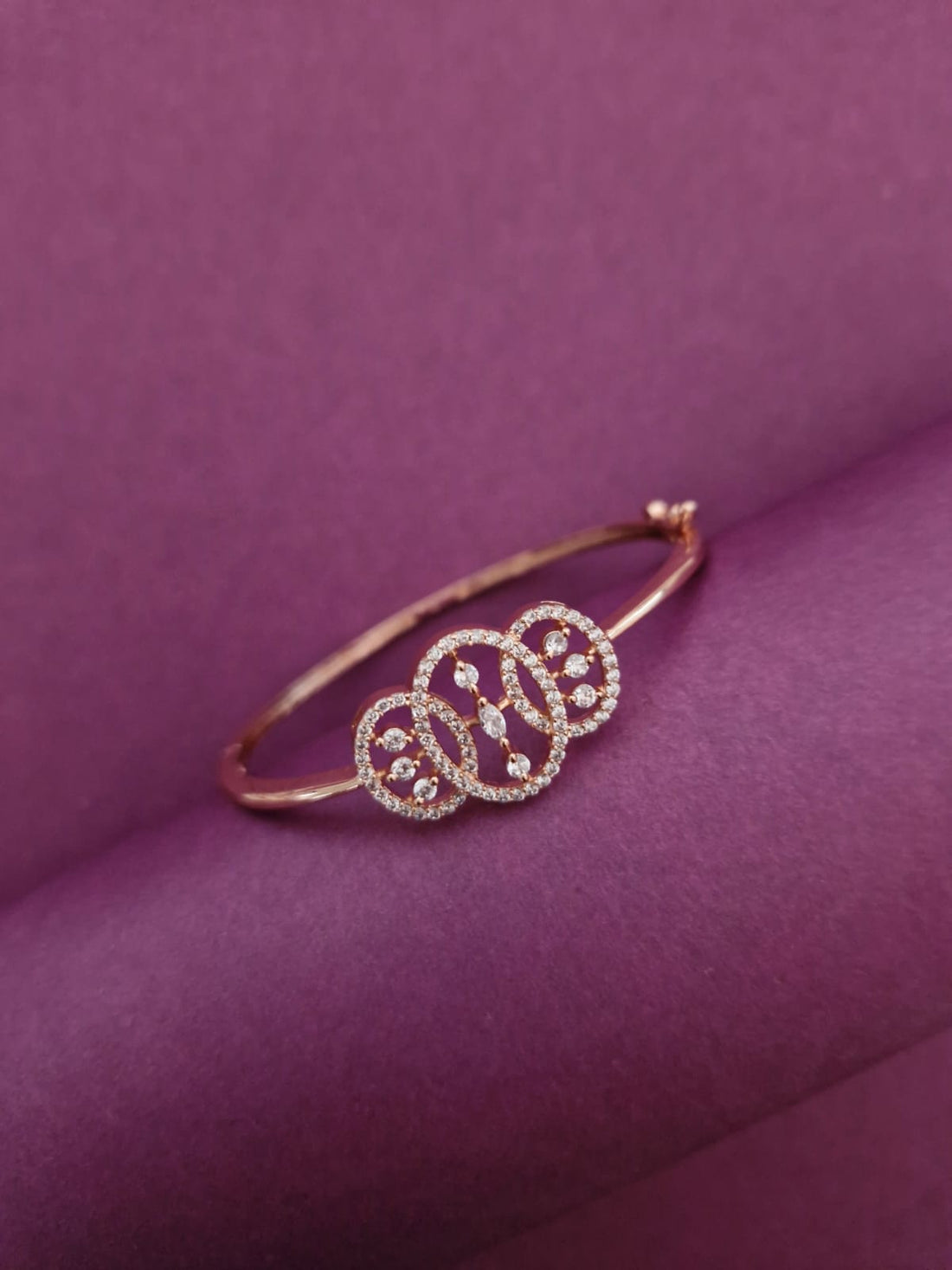 Rose Gold-Tone Interlocking Circle American Diamond Bangle